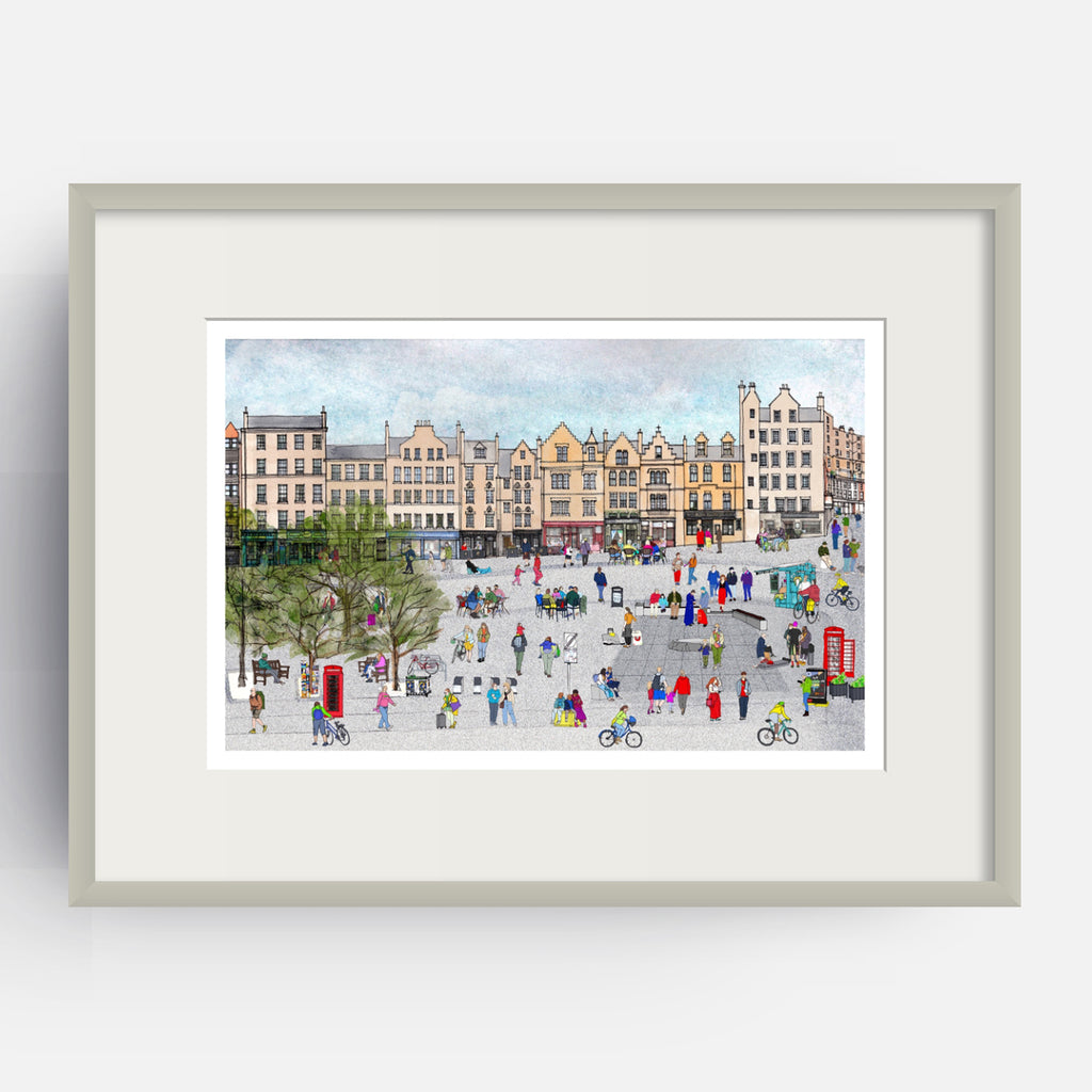 A framed art print featuring a colourful, detailed illustration of Edinburgh's Grassmarket with historic buildings, people, bicycles, and red telephone booths, presented in a light grey frame with a white mat against a light grey background.