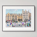 A framed art print depicting Edinburgh Grassmarket with historic yellow and beige buildings, illustrated figures, and a light blue sky, shown against a neutral light grey background.