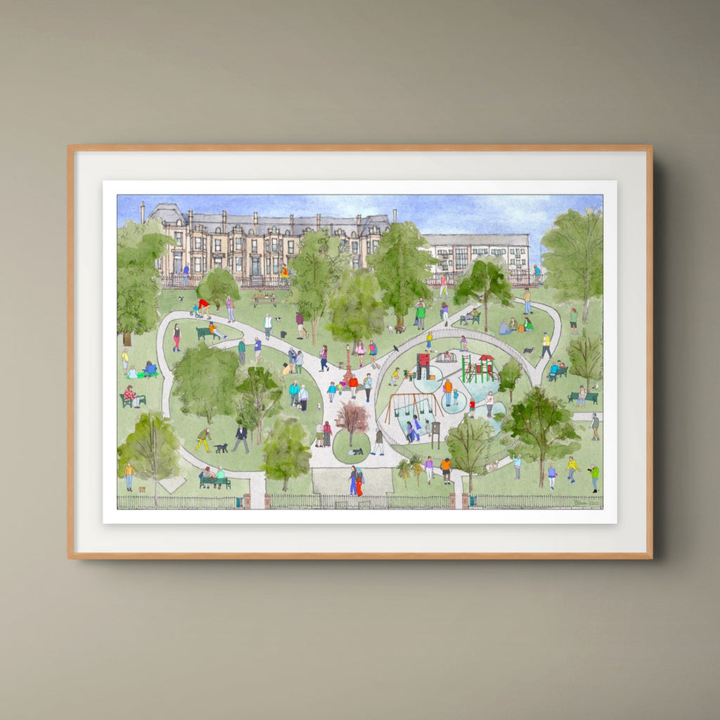 A framed art print depicting a whimsical, hand-drawn illustration of  Dowanhill Park in Glasgow with people, trees, playgrounds, and buildings in the background, mounted on a neutral grey wall.