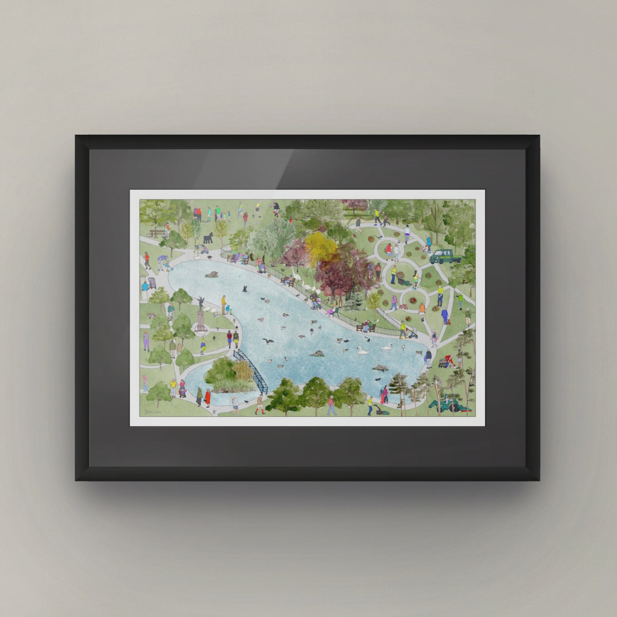A framed art print depicting a whimsical, hand-drawn park scene of Victoria Park in Glasgow with a boating pond, green trees, and small figures of people, presented in a black frame against a neutral grey wall.